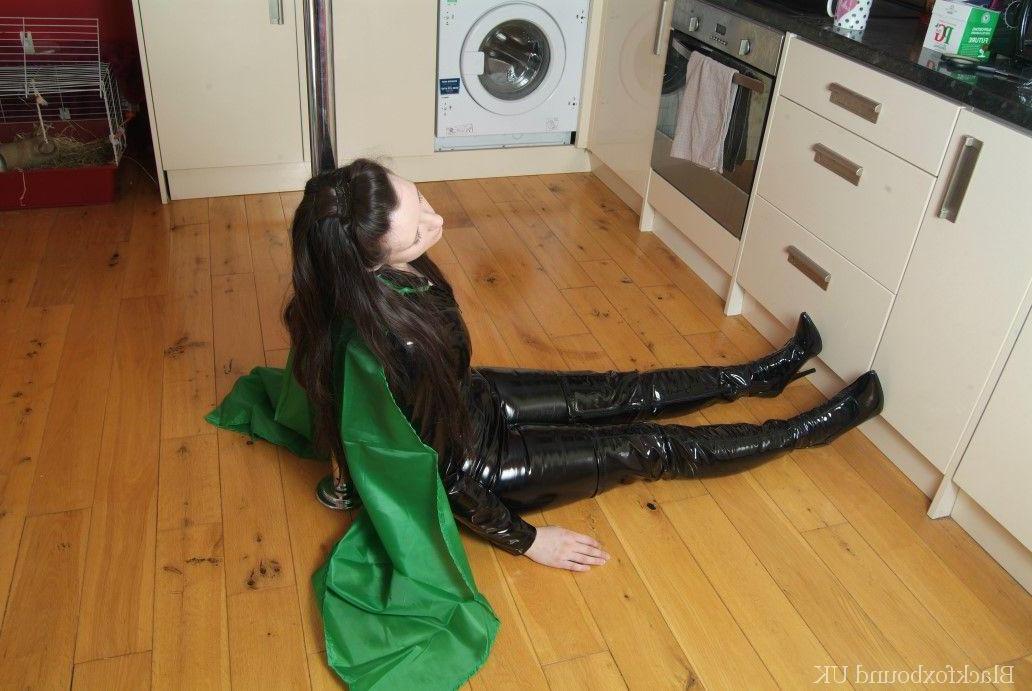 16P Solo girl finds herself restrained with chains in black latex clothing