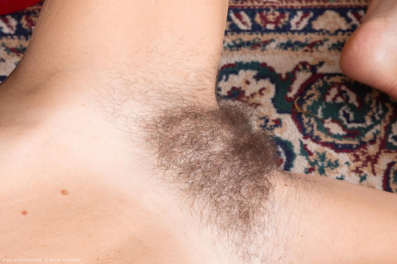 20P Tiny boobed MILF Vanessa Bush strips & bares her hairy pussy on the carpet