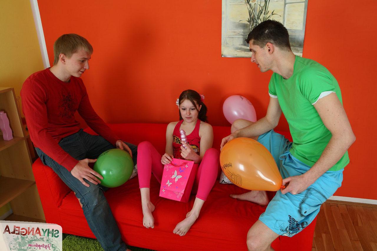 16P Young looking girl blows up balloons before having sex with two boys at once