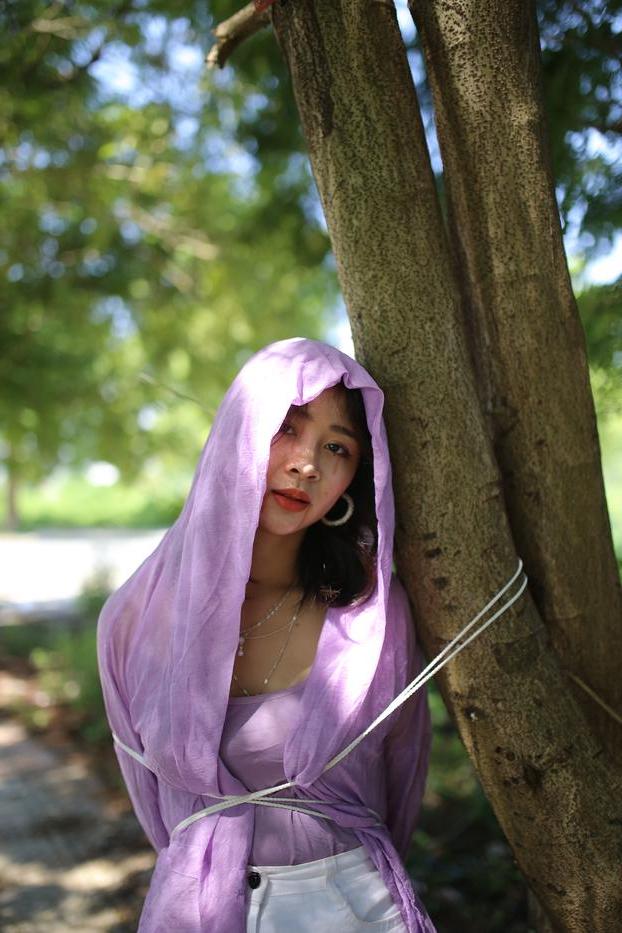 20P Asian seductress Nhatle posing in her amazing Halloween costume outdoors