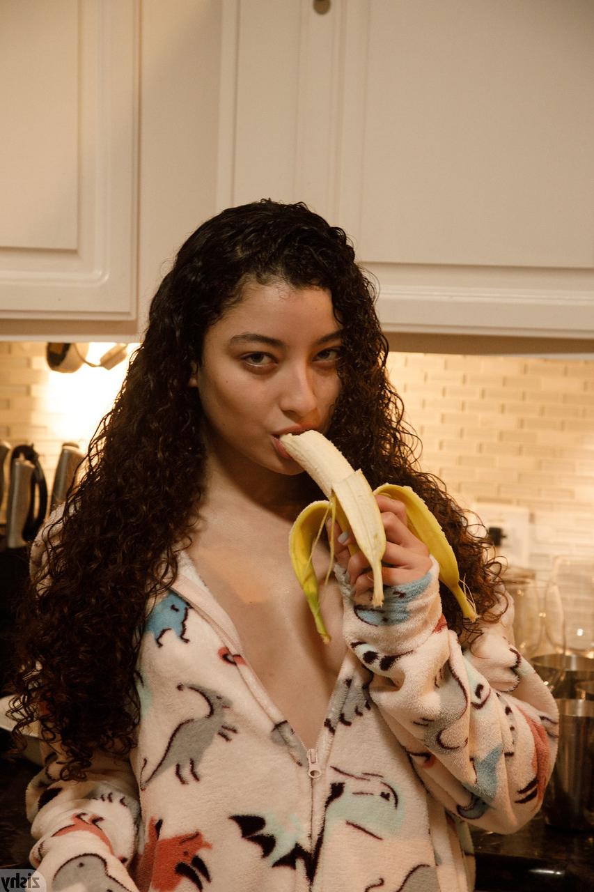 13P Lovely curly-haired babe Lana Lovelace shows her big ass & her trimmed bush