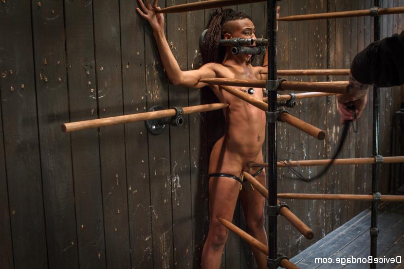 15P Ebony girl is silenced while being masturbated in a bondage situation