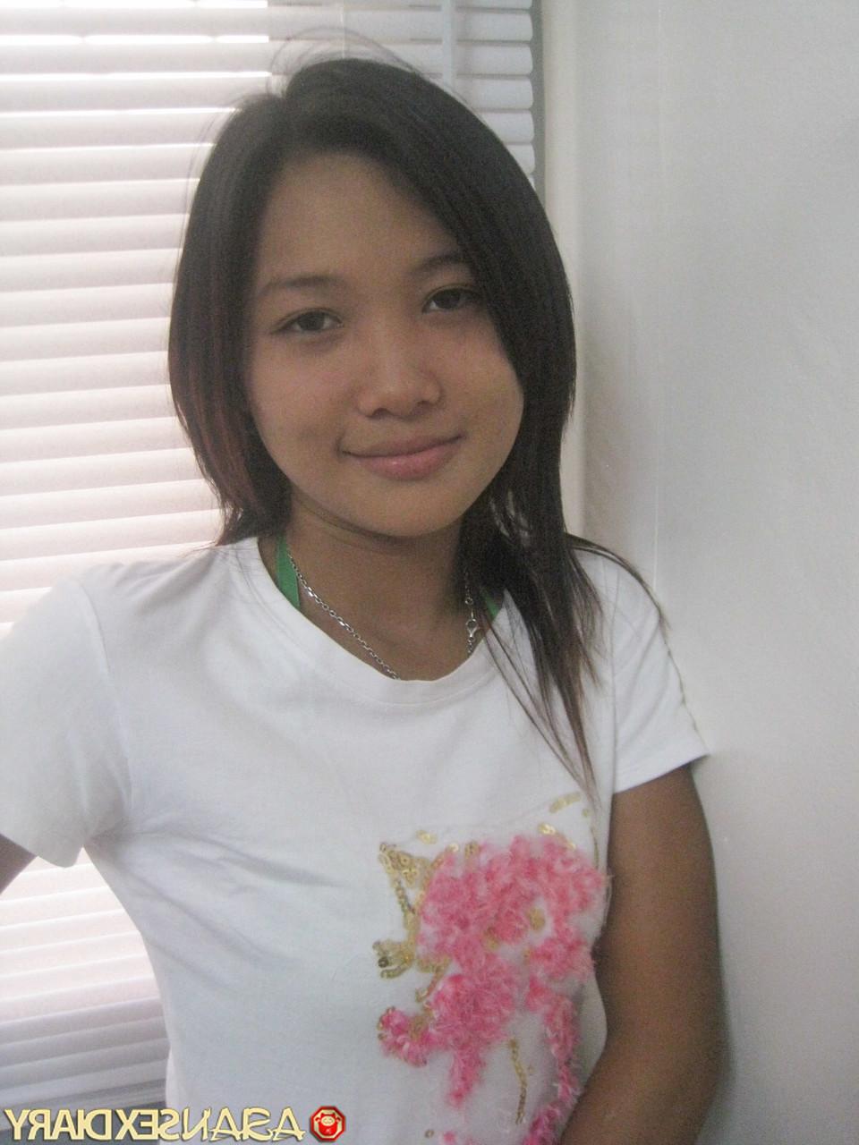 15P Sweet Asian babe Ann stripping and posing naked at the hotel room