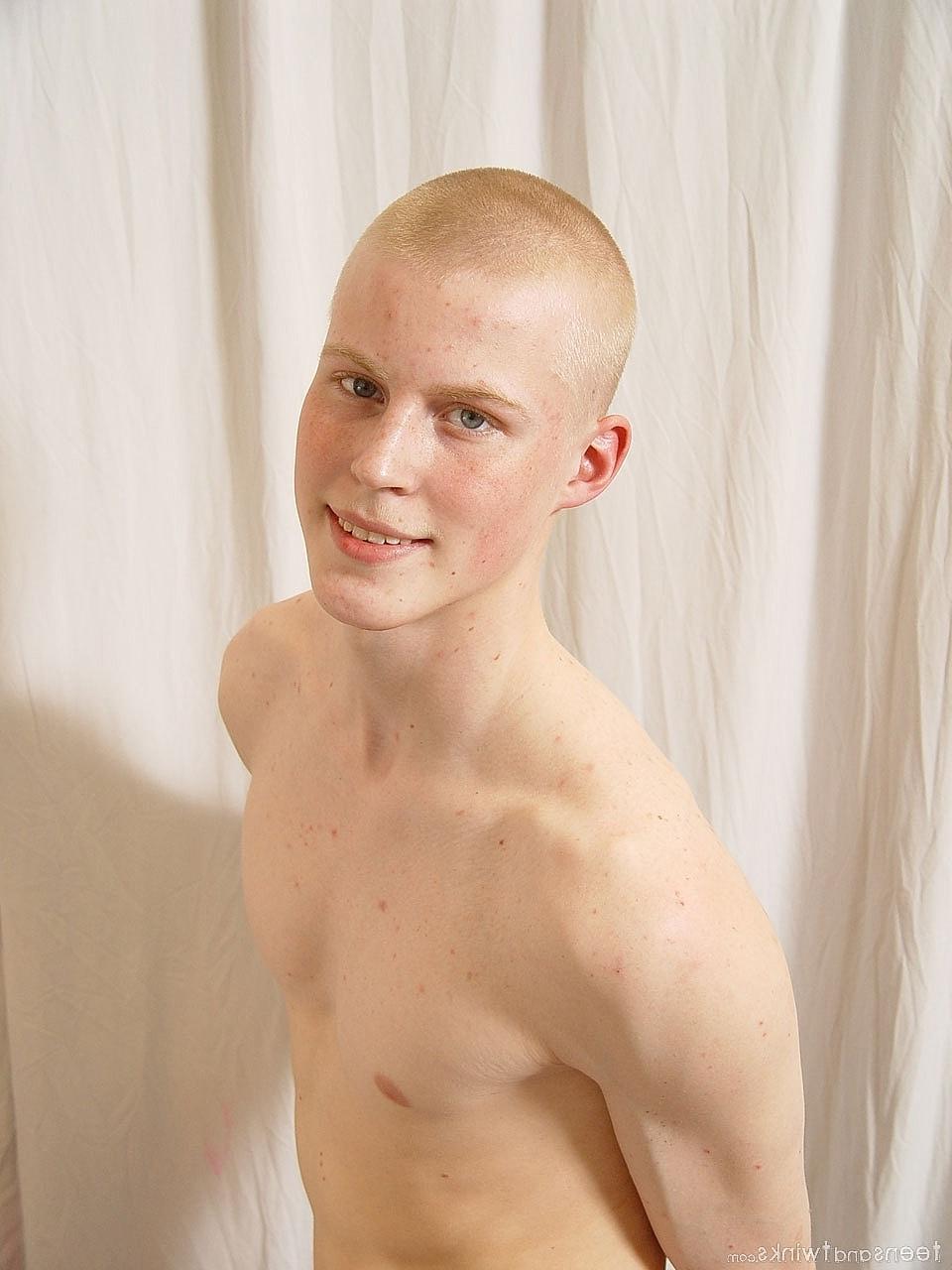 20P Hot twink shows off his fine ass and his uncut hairy cock while fully naked