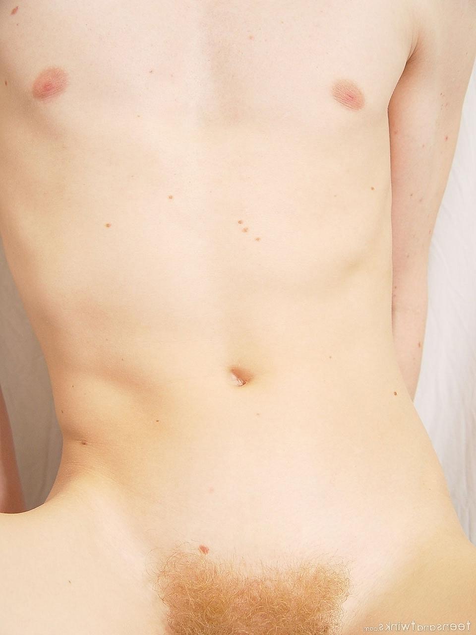 20P Hot twink shows off his fine ass and his uncut hairy cock while fully naked