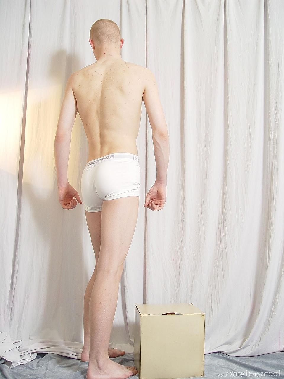 20P Hot twink shows off his fine ass and his uncut hairy cock while fully naked