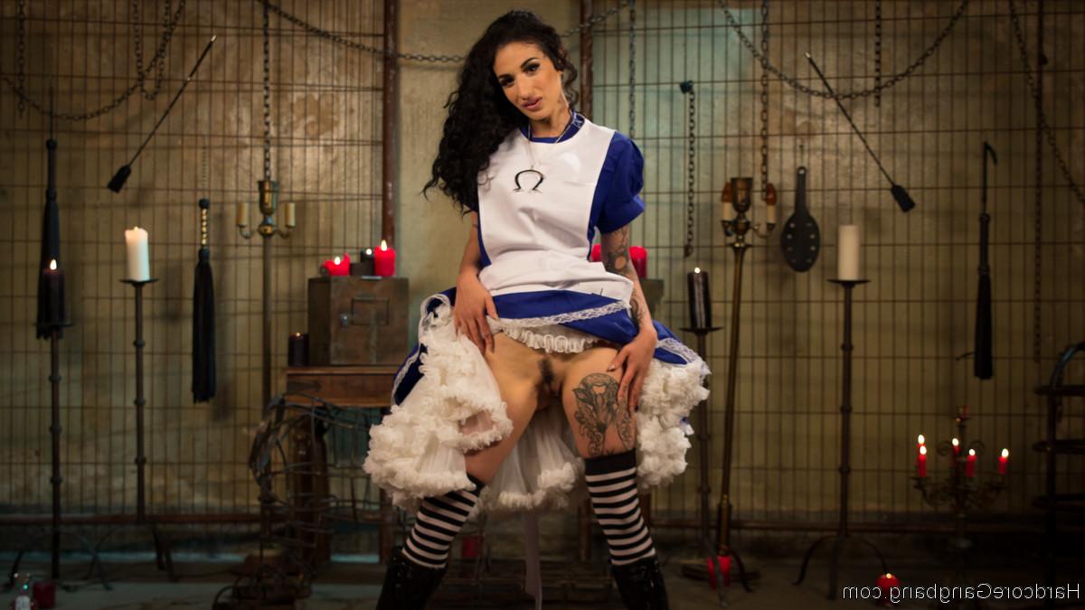 20P Gorgeous brunette Arabelle Raphael teasing her BDSM crew in a cosplay costume