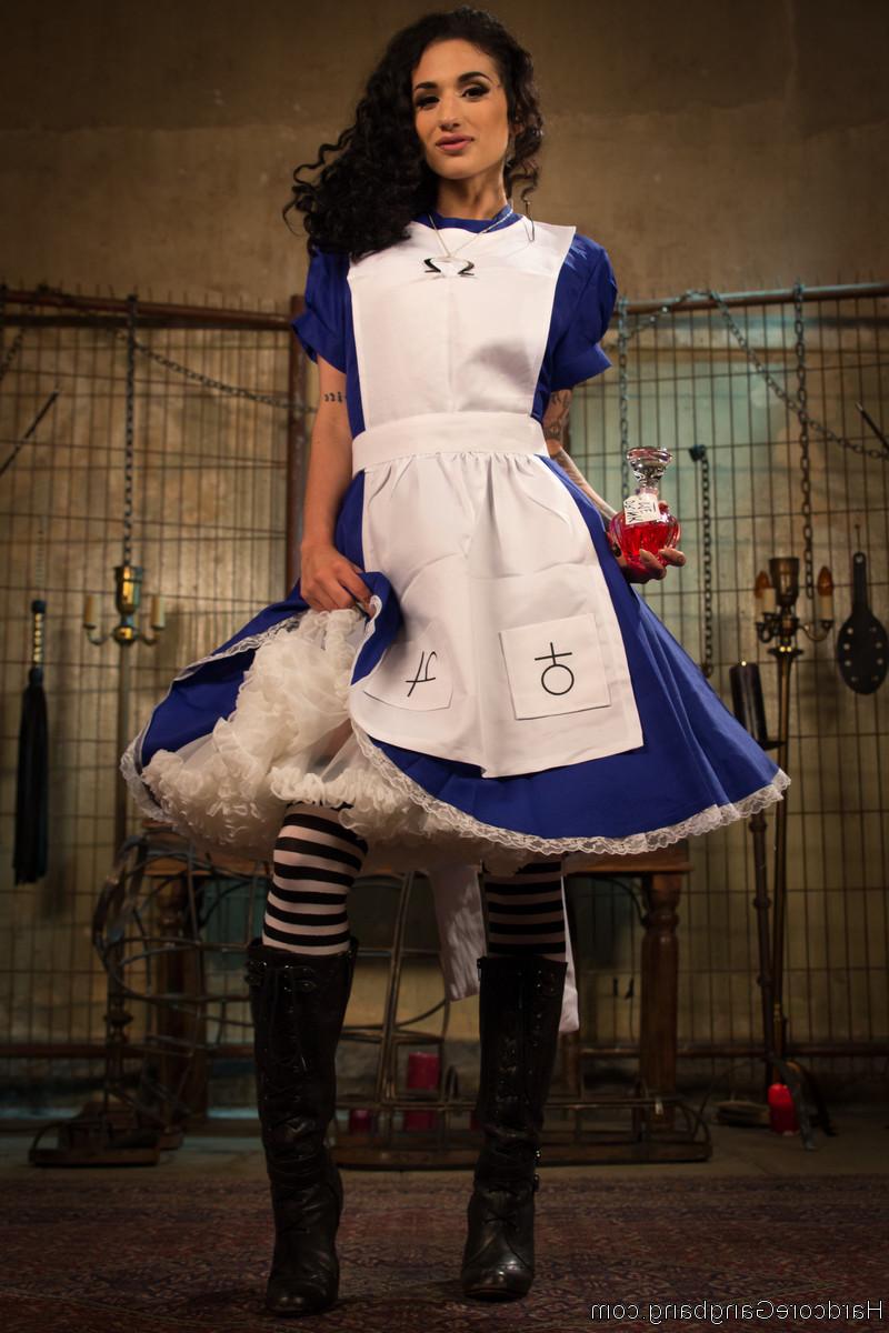20P Gorgeous brunette Arabelle Raphael teasing her BDSM crew in a cosplay costume