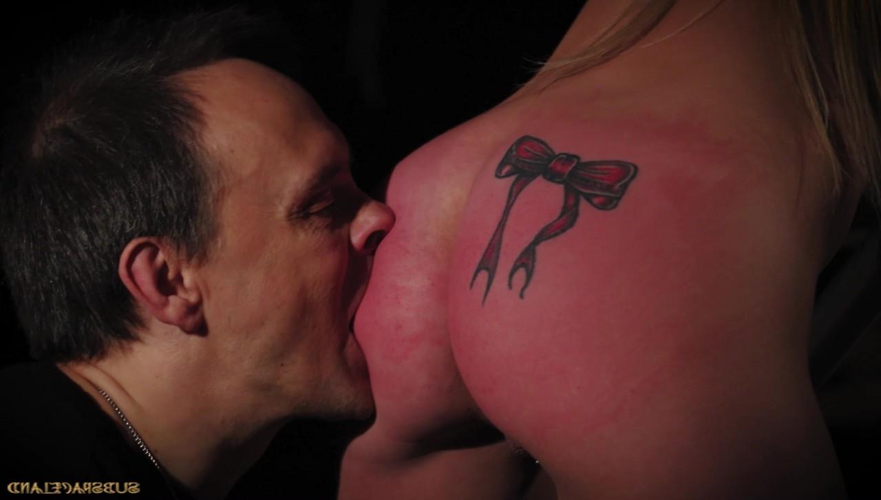 18P Tattooed blonde chick Angie Lee endures hot-wax in a BDSM scene