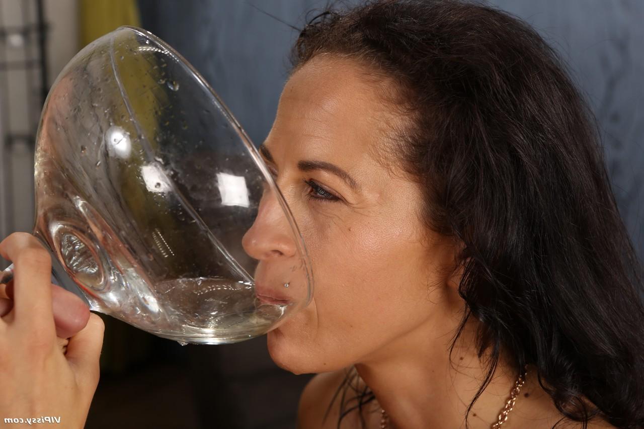 15P Strapon lesbians Vanessa Twain and Eileen drink their pee after a fuck