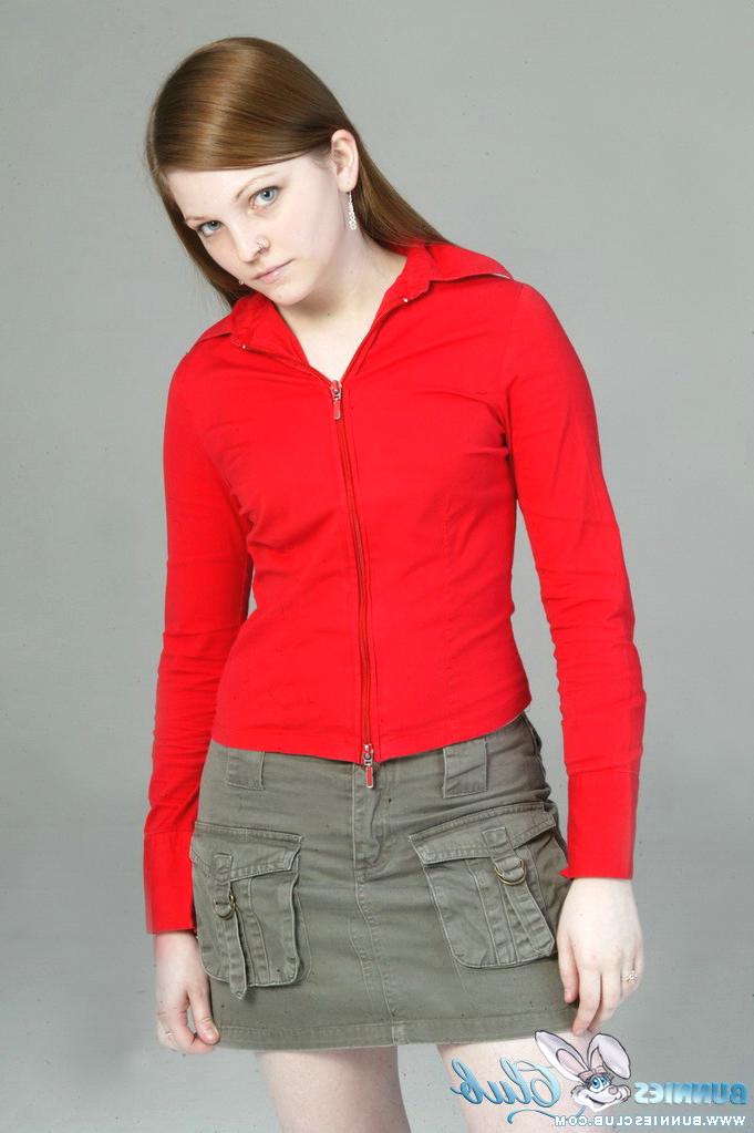 20P Pale redhead Lilly slowly strips to a black G-string and red leather boots