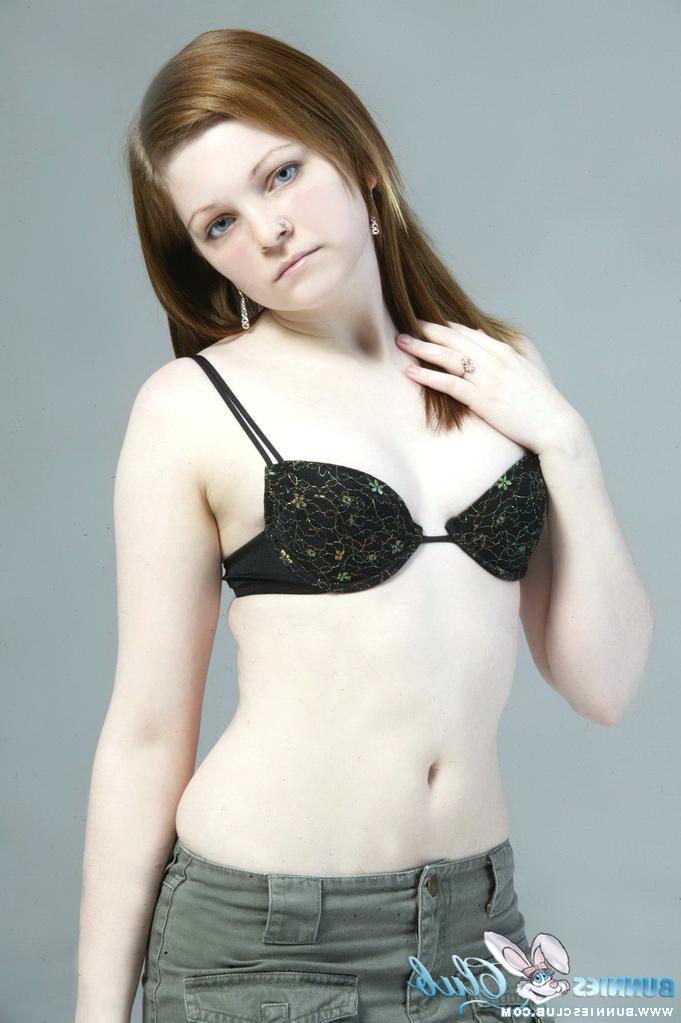 20P Pale redhead Lilly slowly strips to a black G-string and red leather boots
