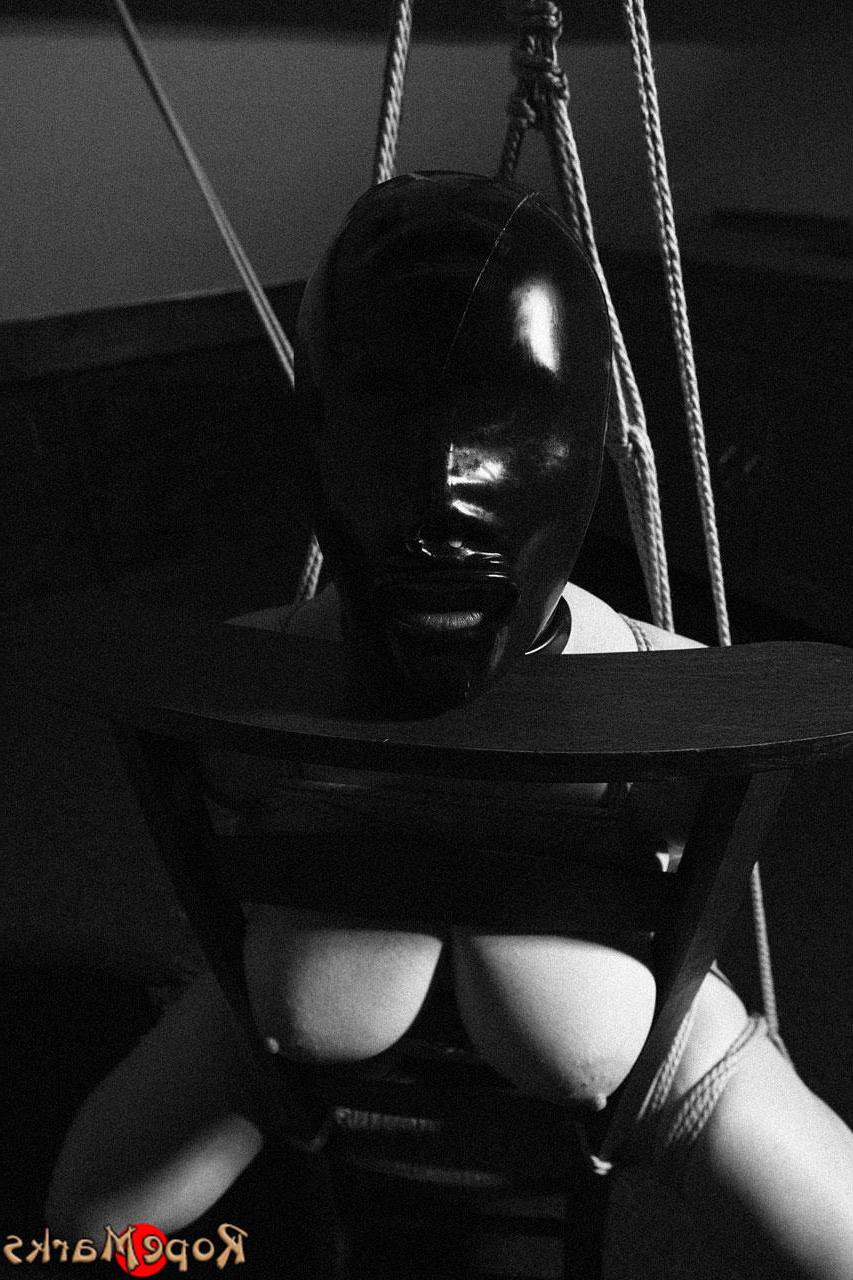 16P Hooded model Amely is tied and suspended by ropes in an attic setting