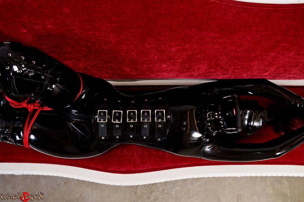 16P Natural redhead finds herself tied up while wearing head to toe latex clothing