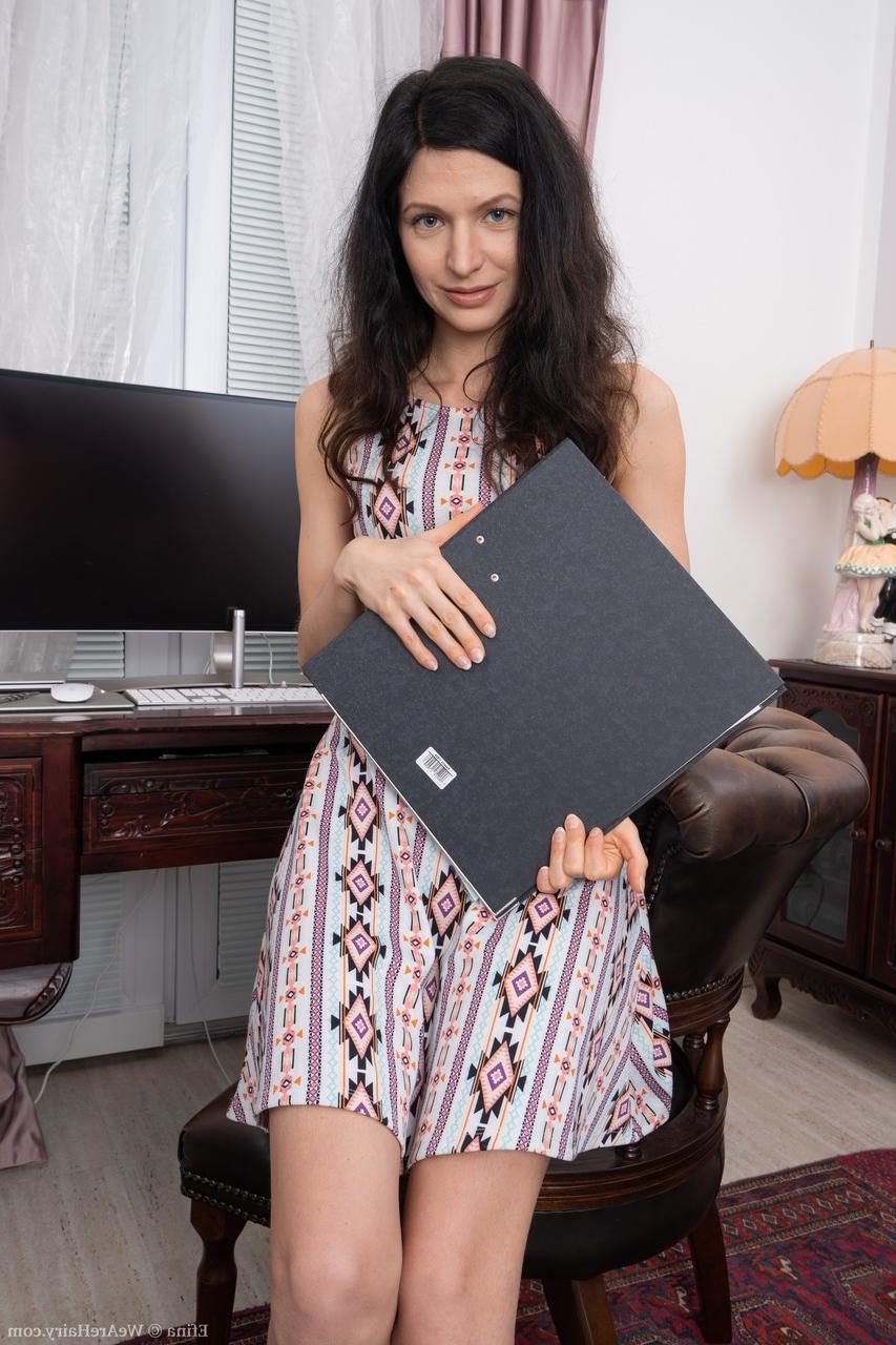 20P Dark-haired MILF Efina strips & spreads her pussy in front of the PC