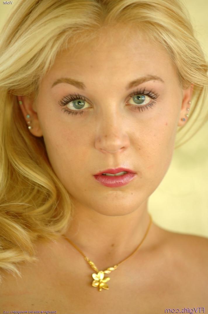 20P Tall blonde babe Violet posing in her lingerie & licking her boobs in public