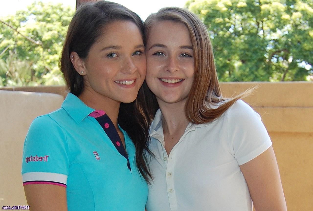 11P Beautiful Danni and Zoe undress completely and hug naked outdoors