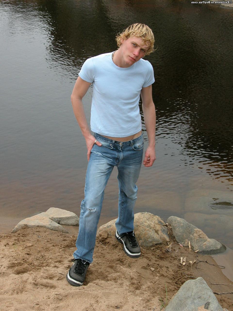 20P Golden-haired gay hottie Jarrod stripping naked and jerking off by the river