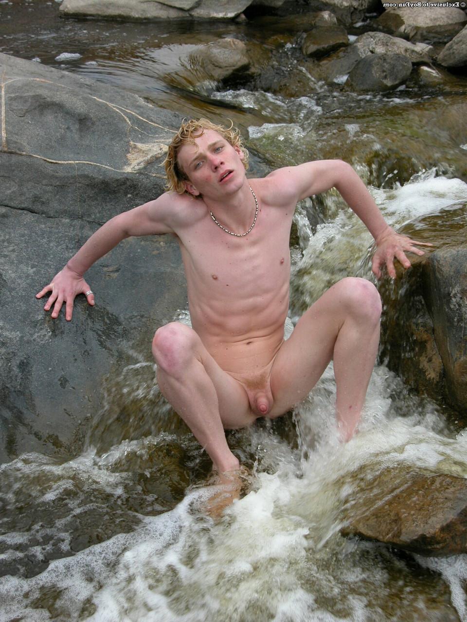 20P Golden-haired gay hottie Jarrod stripping naked and jerking off by the river