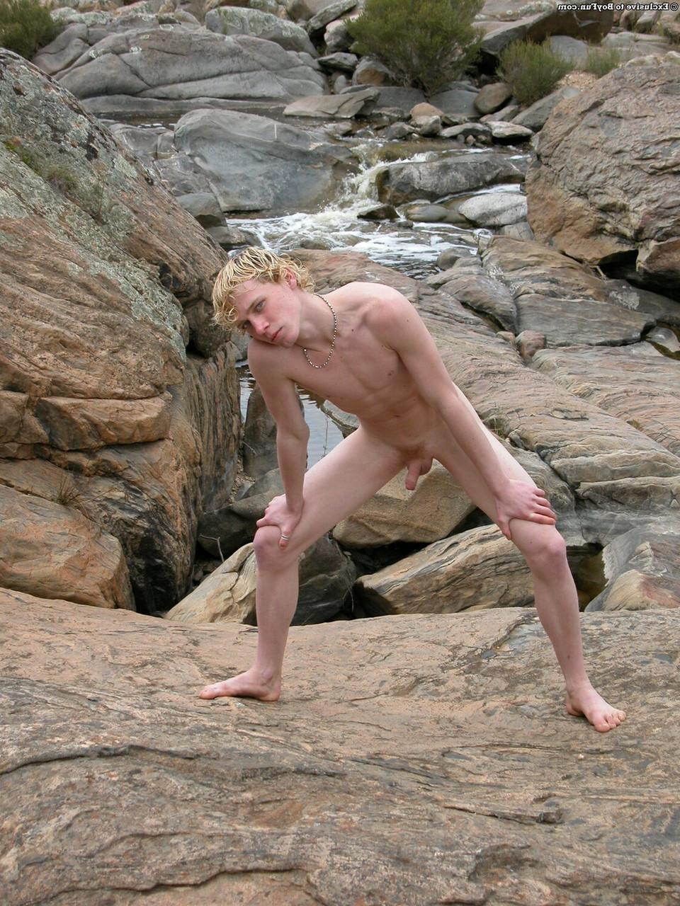20P Golden-haired gay hottie Jarrod stripping naked and jerking off by the river