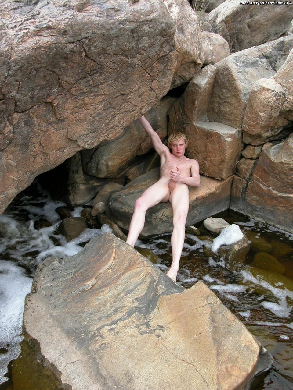 20P Golden-haired gay hottie Jarrod stripping naked and jerking off by the river