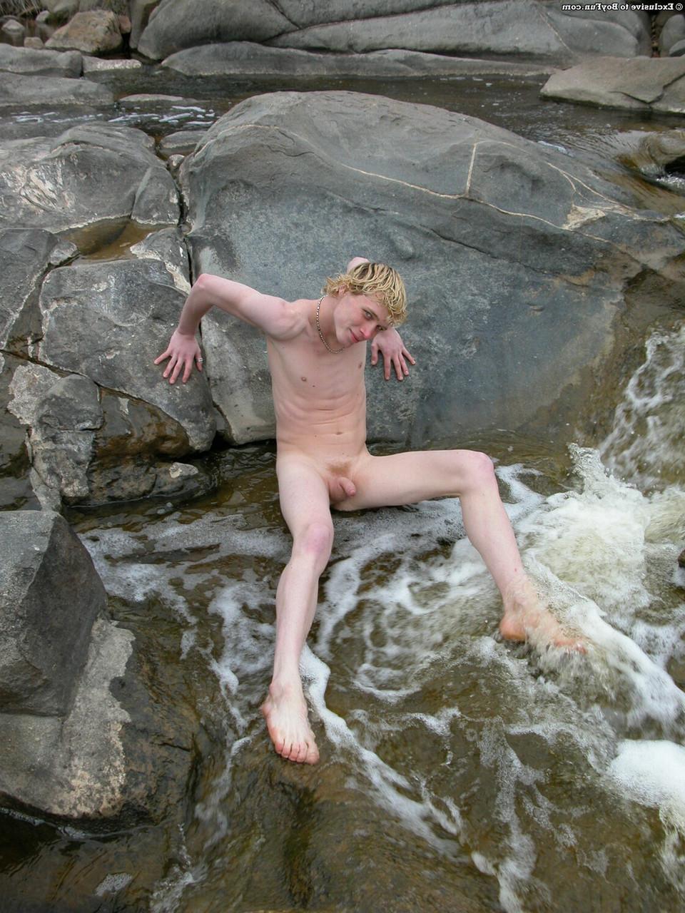 20P Golden-haired gay hottie Jarrod stripping naked and jerking off by the river