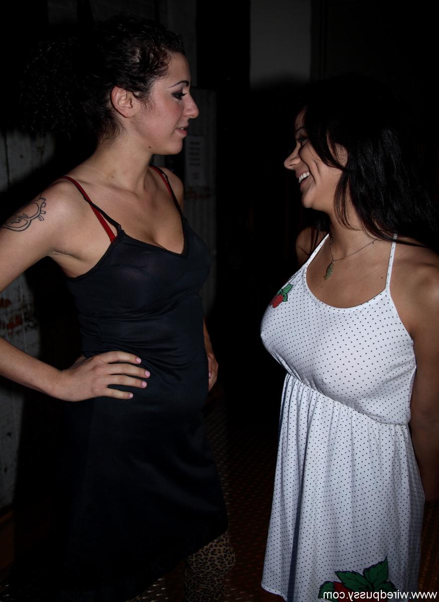 20P Pretty lesbian Nadia Styles unveils her big tits while teasing in a sexy dress