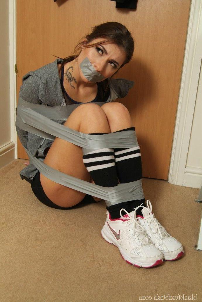16P Caucasian female is gagged and tied up with duct tape in shorts and knee socks