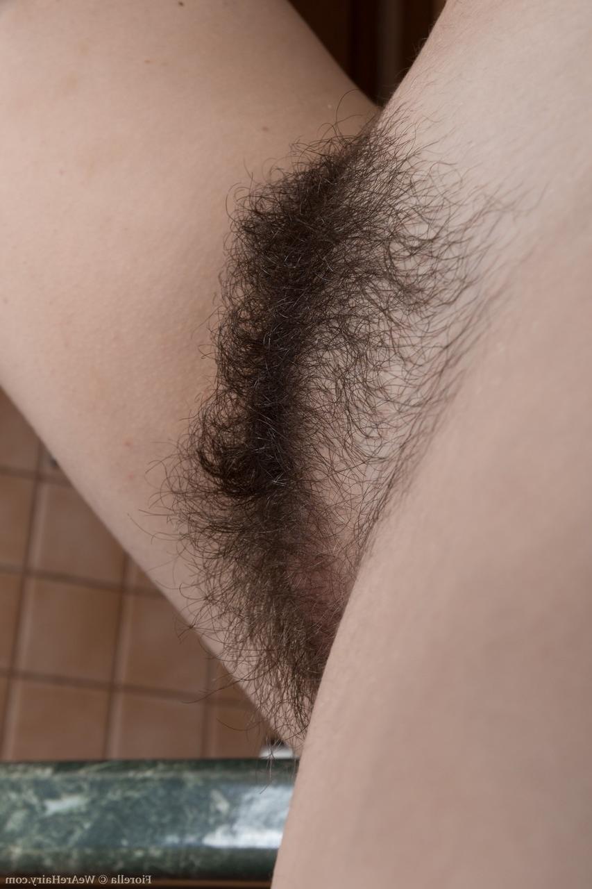 18P Hairy dish Fiorella show puffy nipples & hairy pits & west her fuzzy pussy