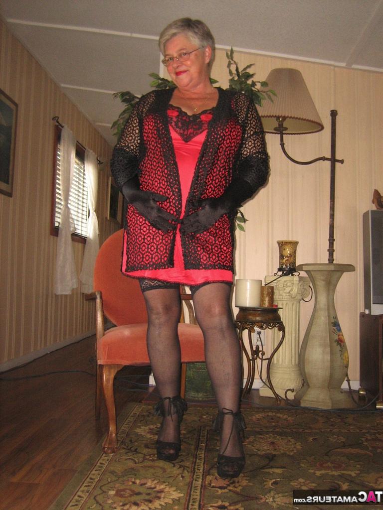 20P Old lady Girdle Goddess casts off lingerie to pose nude in hosiery and gloves