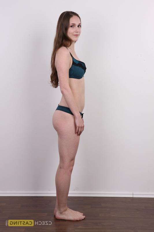 20P Girl next door type Klara takes off her clothes and boots to go bare naked