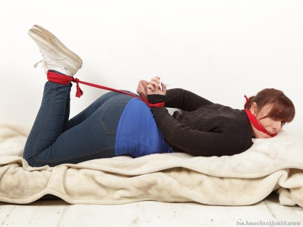16P Natural redhead manages to hogtie herself while fully clothed