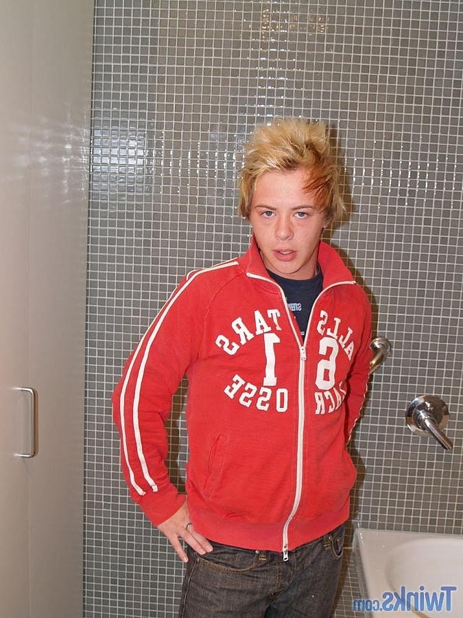 20P Good-looking twink Shayne H plays with his small dick in the bathroom