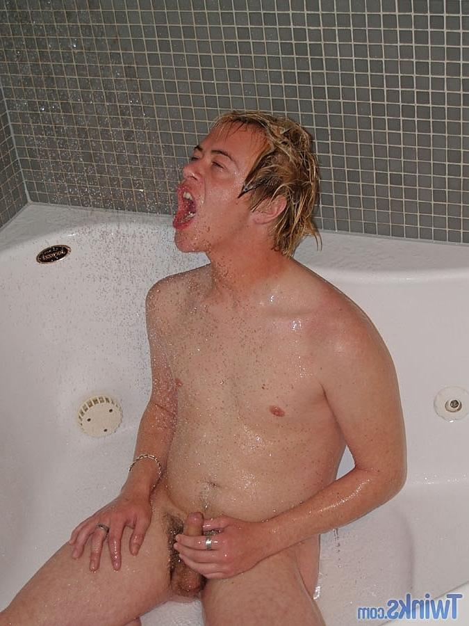 20P Good-looking twink Shayne H plays with his small dick in the bathroom