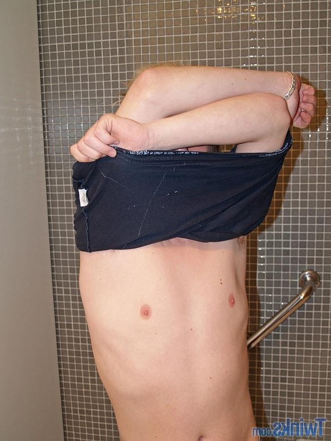 20P Good-looking twink Shayne H plays with his small dick in the bathroom