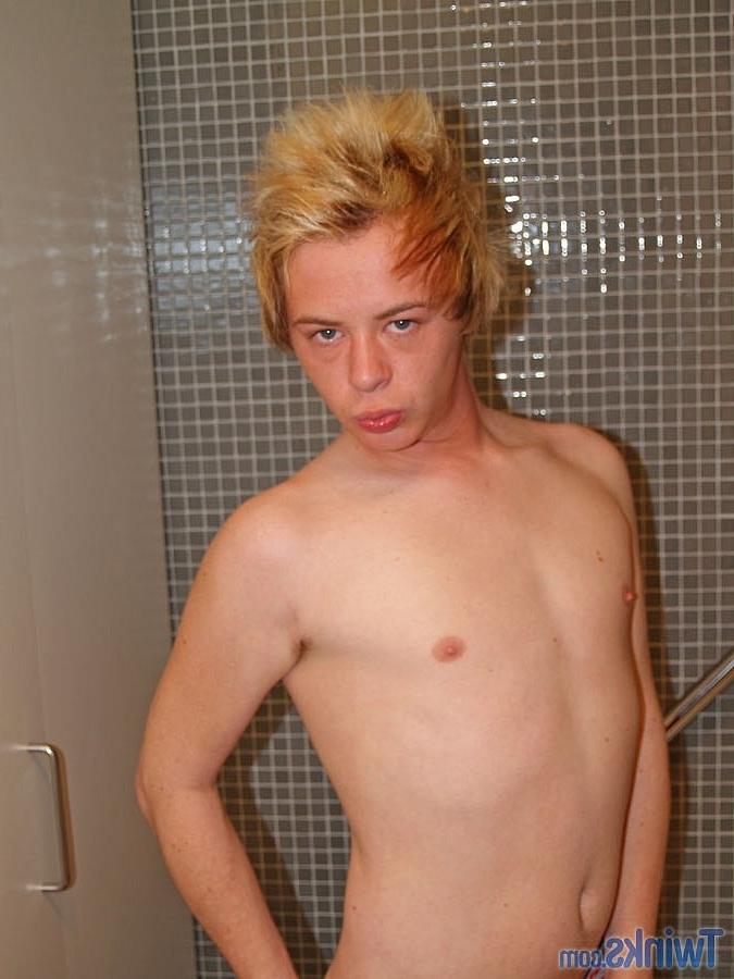 20P Good-looking twink Shayne H plays with his small dick in the bathroom