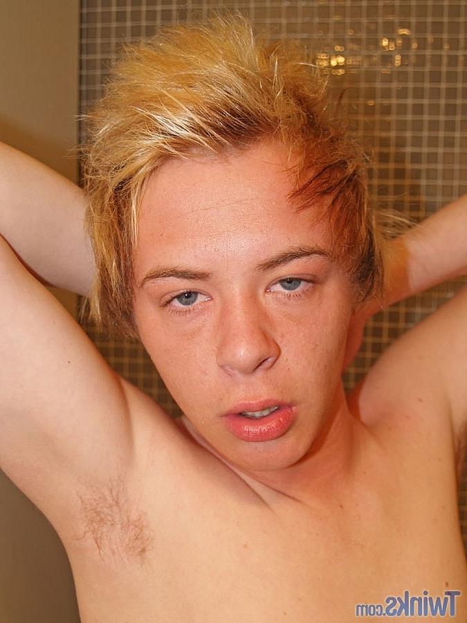 20P Good-looking twink Shayne H plays with his small dick in the bathroom