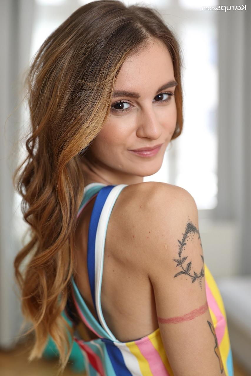 18P Tattooed girl Adelle Unicorn doffs a rainbow dress prior to masturbating