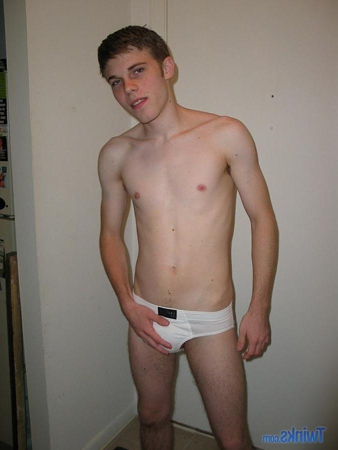 20P Caucasian twink Billy Gee strips and plays with his huge dick in the hallway