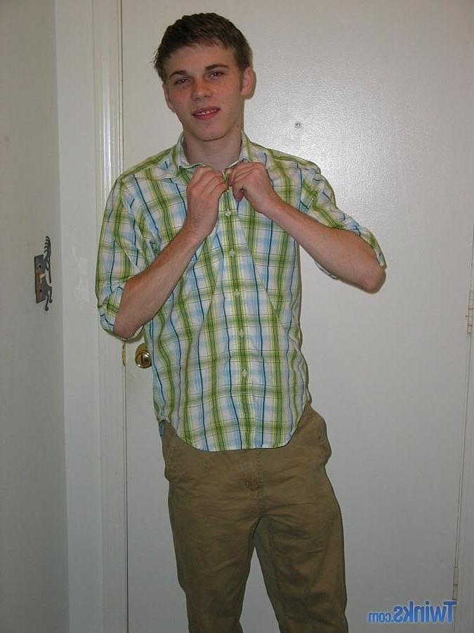 20P Caucasian twink Billy Gee strips and plays with his huge dick in the hallway