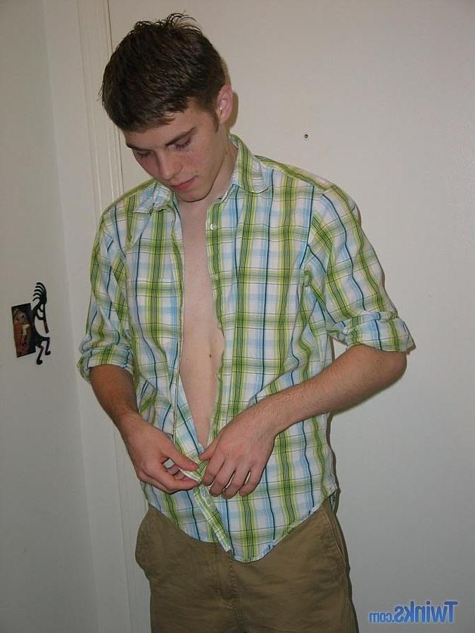20P Caucasian twink Billy Gee strips and plays with his huge dick in the hallway