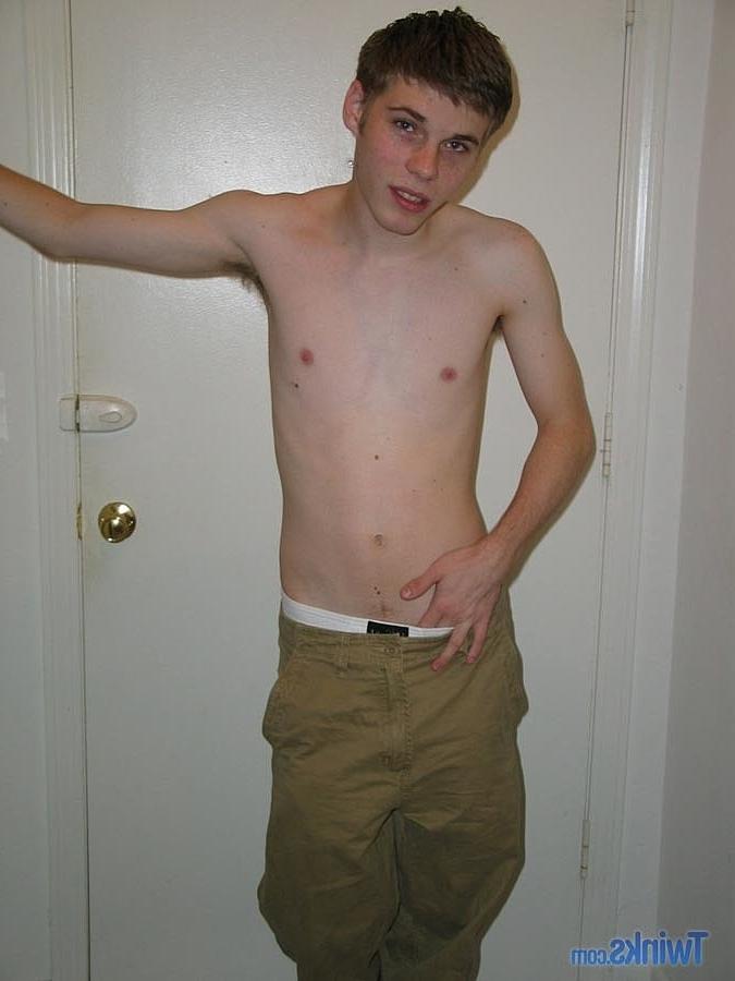 20P Caucasian twink Billy Gee strips and plays with his huge dick in the hallway