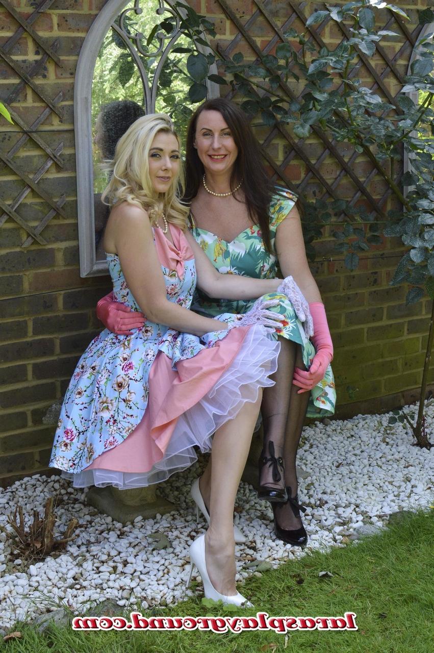 20P Glamorous lesbians Sapphire & Lara finger each other's snatches outdoors