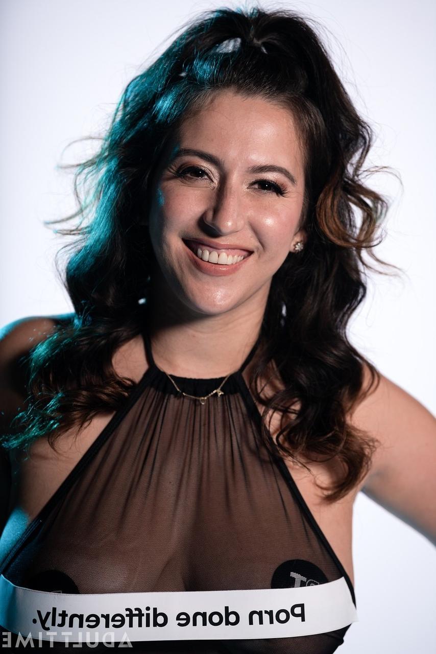 20P Dark-haired American April O'Neil loses her sheer bodysuit & shows her curves