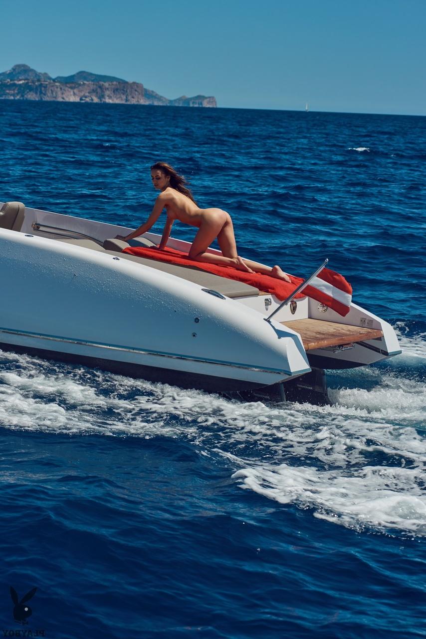20P Pretty babe Veronika Klimovits shows her petite body while cruising in a yacht