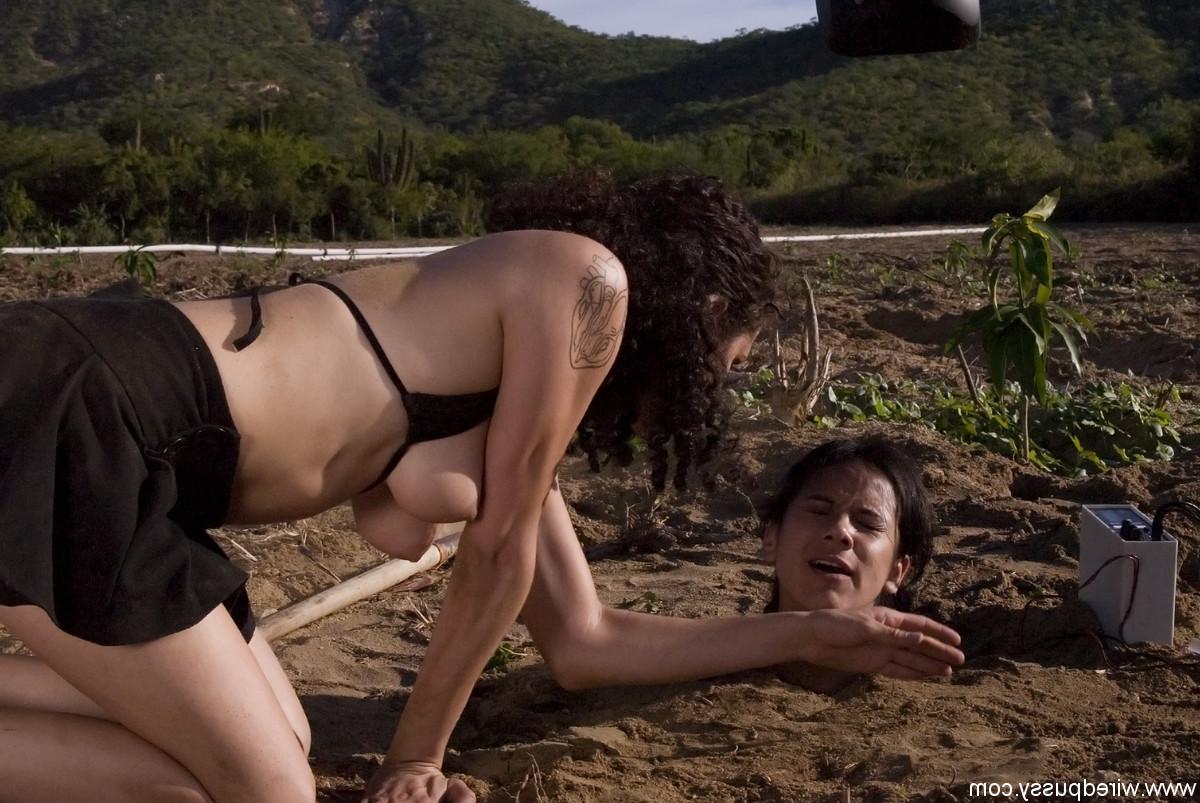 20P Buried babe Nadia Styles gets shocked by a kinky curly-haired female