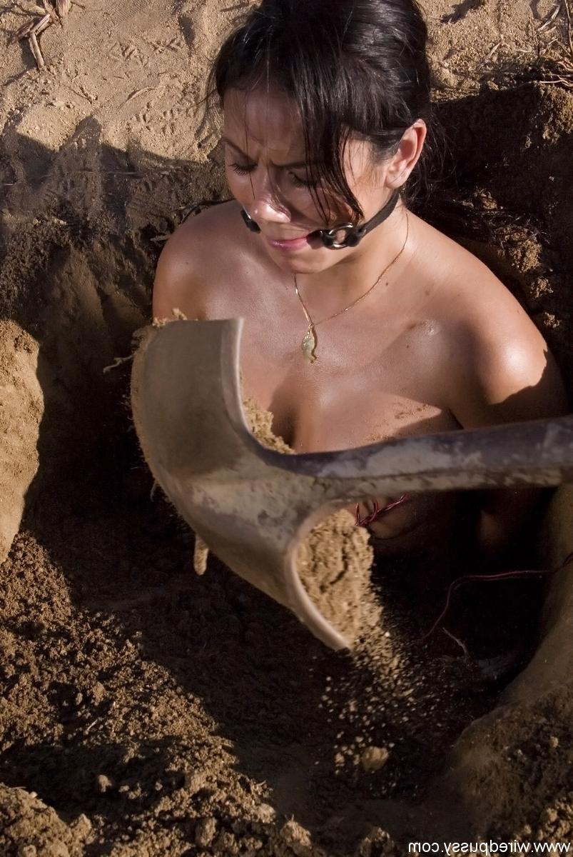 20P Buried babe Nadia Styles gets shocked by a kinky curly-haired female