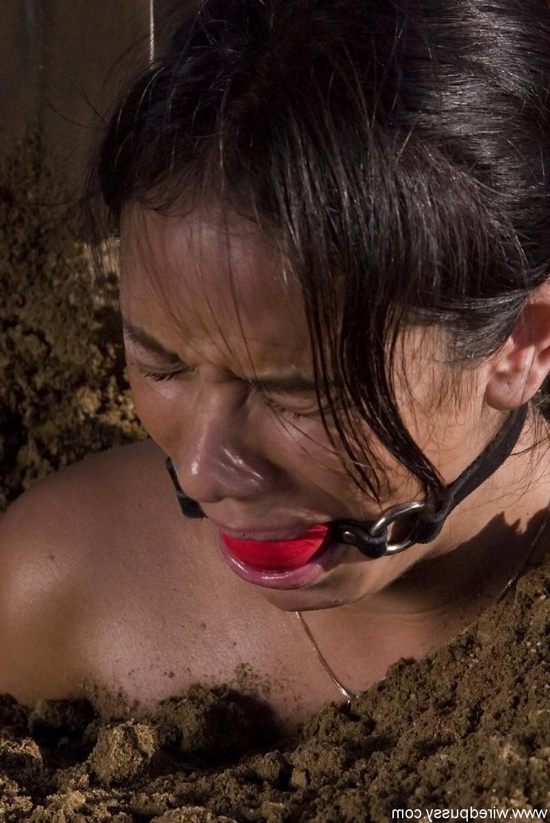 20P Buried babe Nadia Styles gets shocked by a kinky curly-haired female