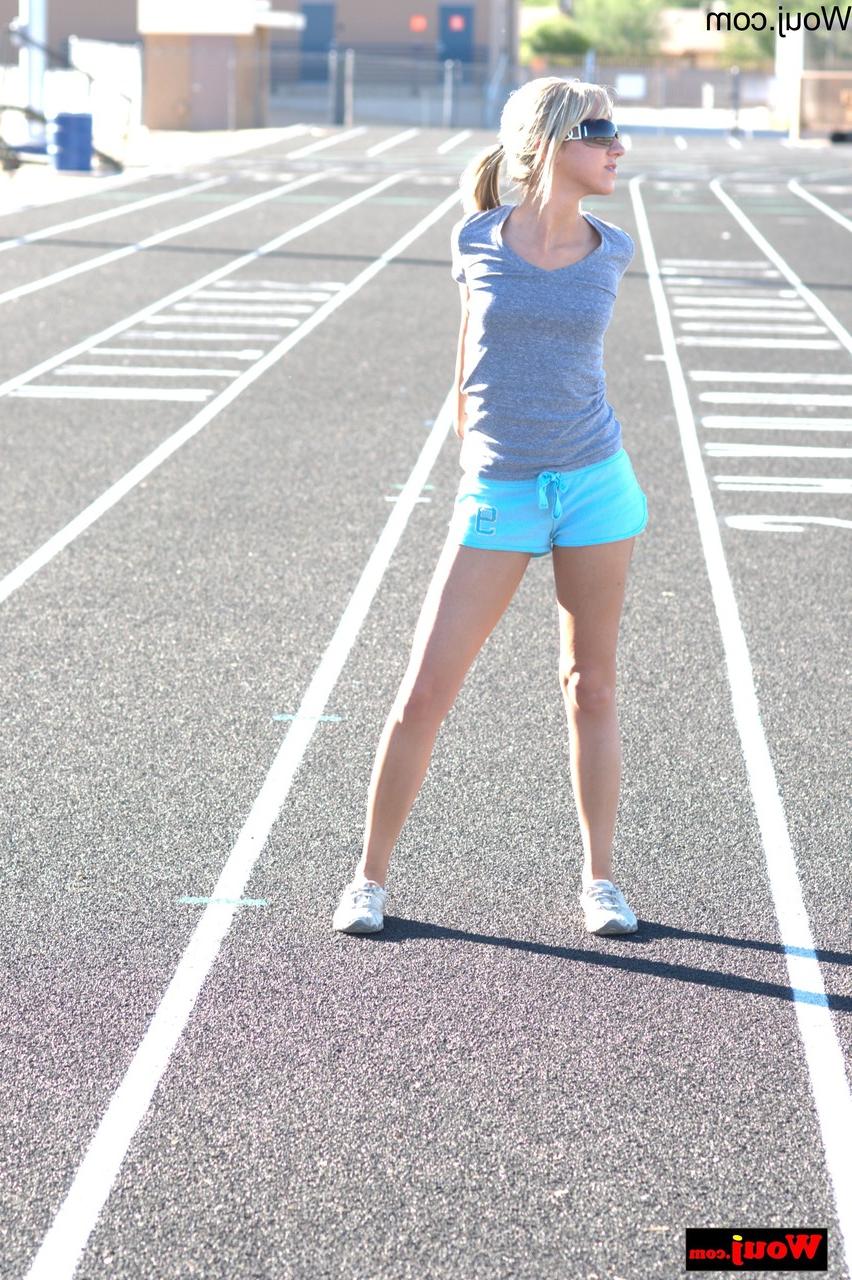 14P Beautiful babe WouJ teases in her sport shorts & sunglasses outdoors