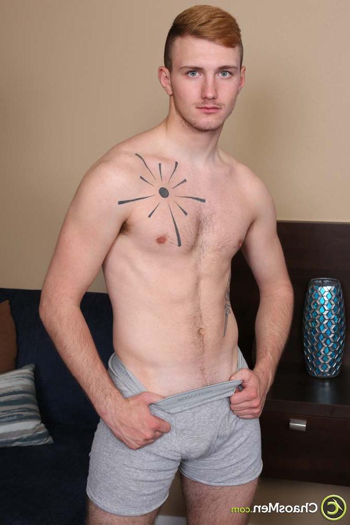 20P Redheaded twink Theodore shows his inked chest and hairy penis in a solo